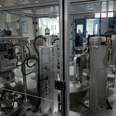 Non-standard automated liquid detergent cap assembly machine, capable of being operated by one person simultaneously on two units.